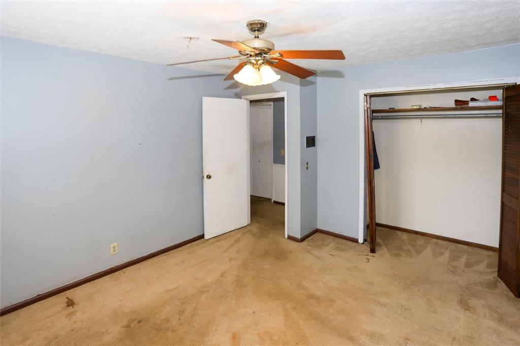 3462 Fairview Road Covington, GA 30016 - Photo 29 of 55 a view of empty room with ceiling fan
