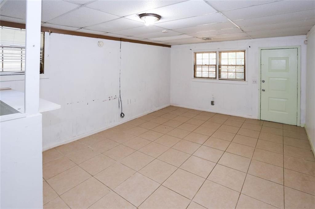 3462 Fairview Road Covington, GA 30016 - Photo 37 of 55 an empty room with windows