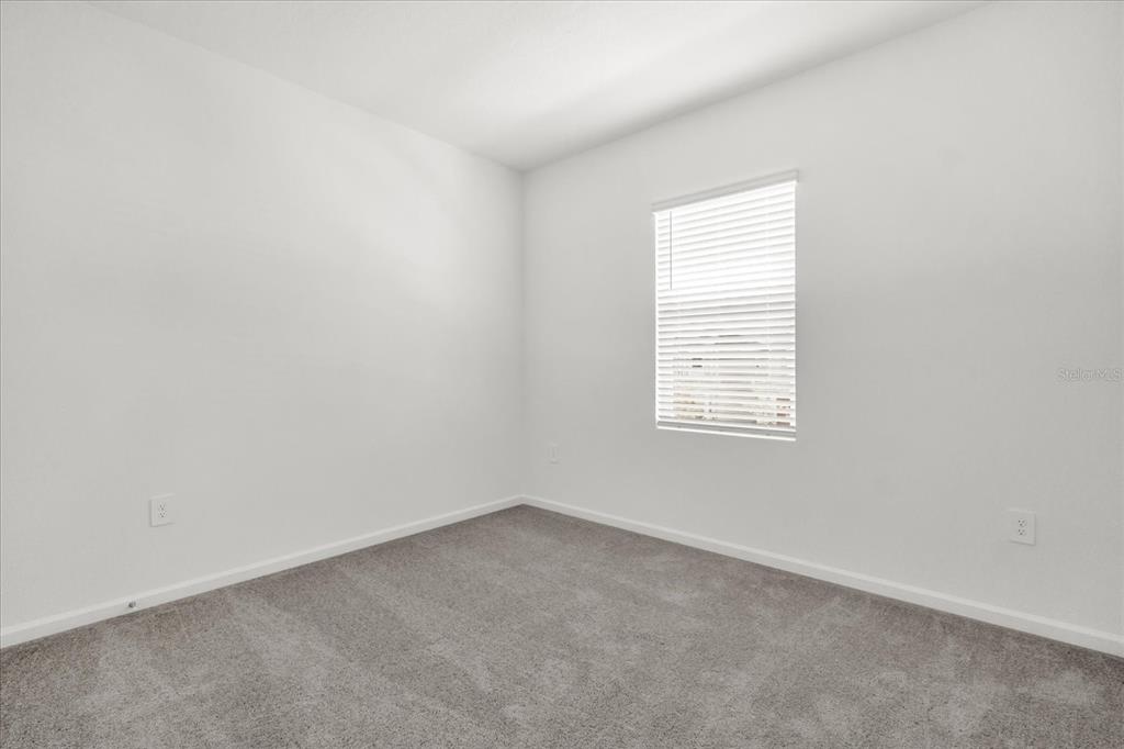 2911 Transformation Way Clermont, FL 34714 - Photo 17 of 27 an empty room with a window