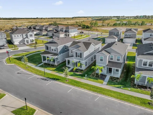 a view of a city with an ocean view