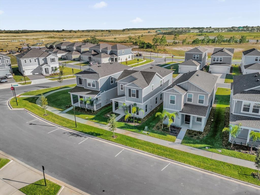2911 Transformation Way Clermont, FL 34714 - Photo 25 of 27 a view of a city with an ocean view