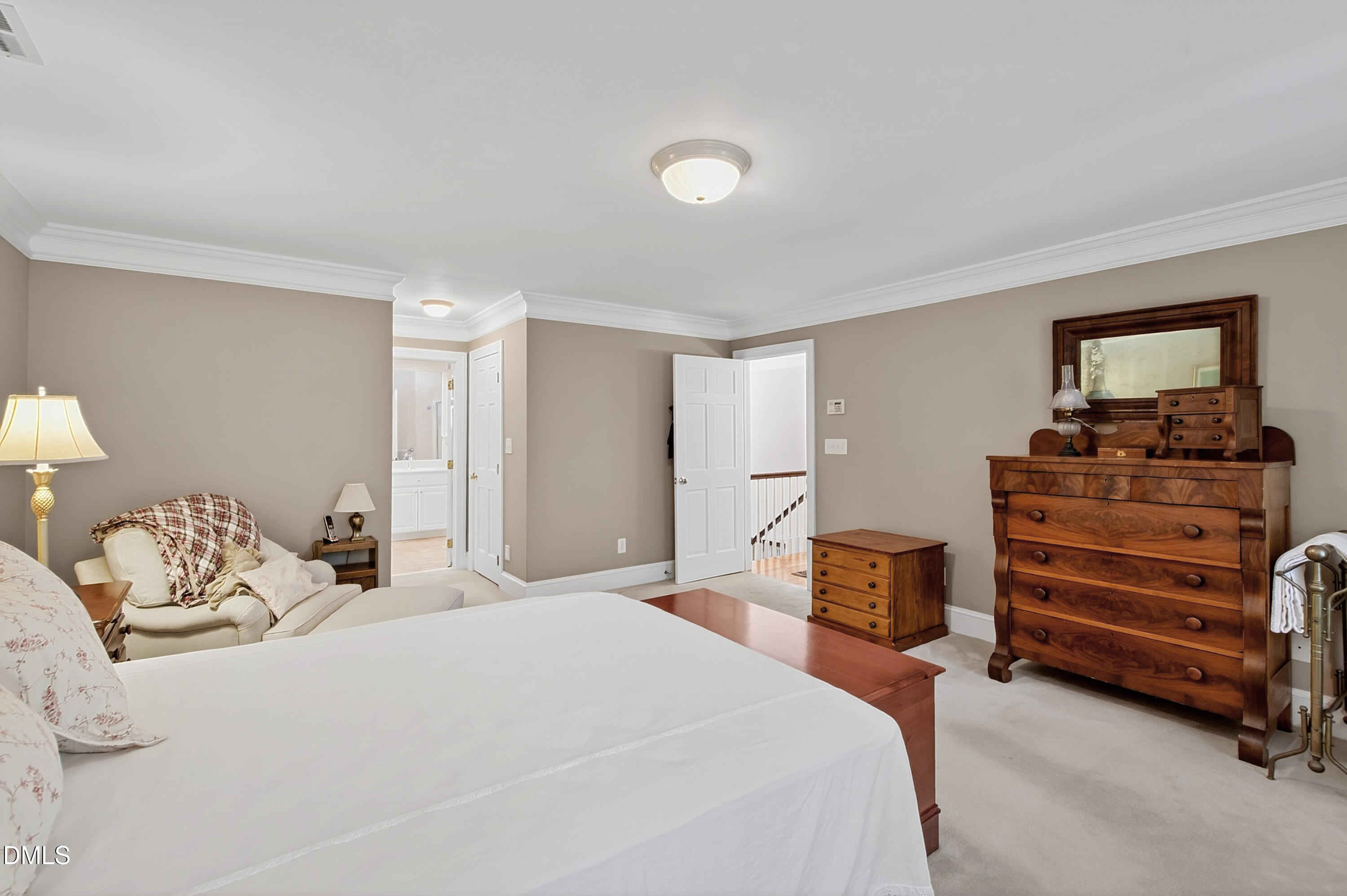 3708 Lubbock Drive Raleigh, NC 27612 - Photo 37 of 64 a bedroom with a bed and furniture