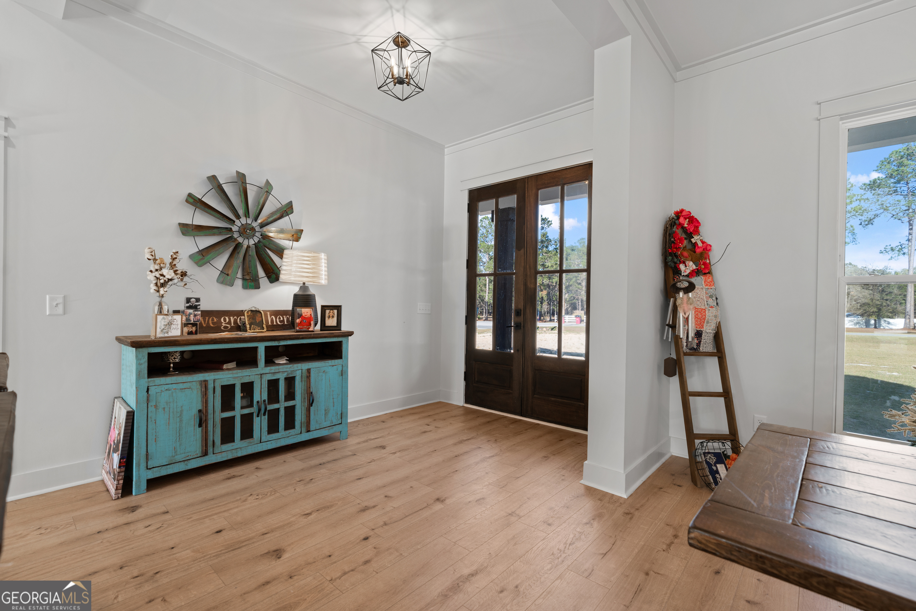 4005 Golfview Drive Blackshear, GA 31516 - Photo 12 of 40 a view of an entryway with wooden floor