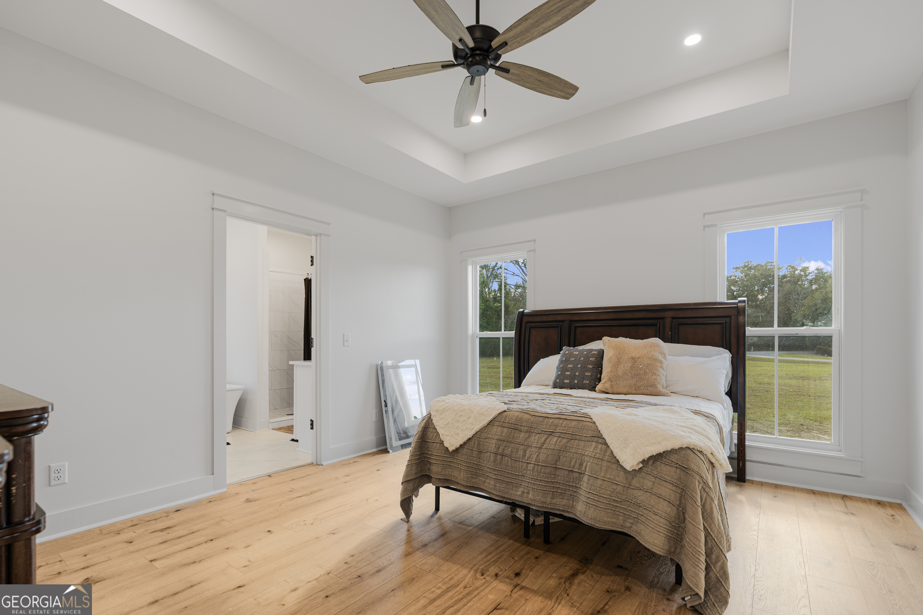 4005 Golfview Drive Blackshear, GA 31516 - Photo 15 of 40 a bedroom with a bed and a window