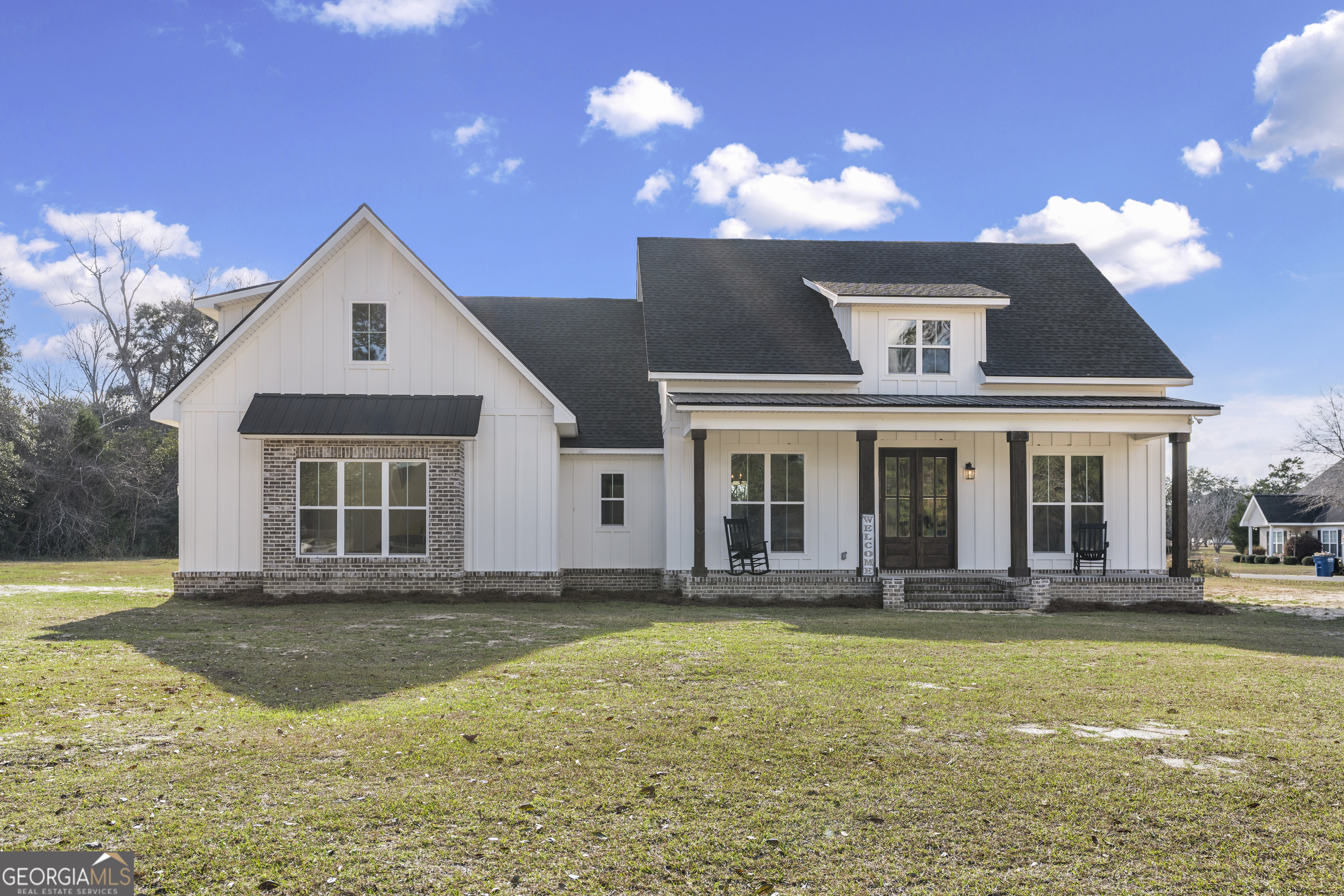 4005 Golfview Drive Blackshear, GA 31516 - Photo 2 of 40 a front view of a house with a yard