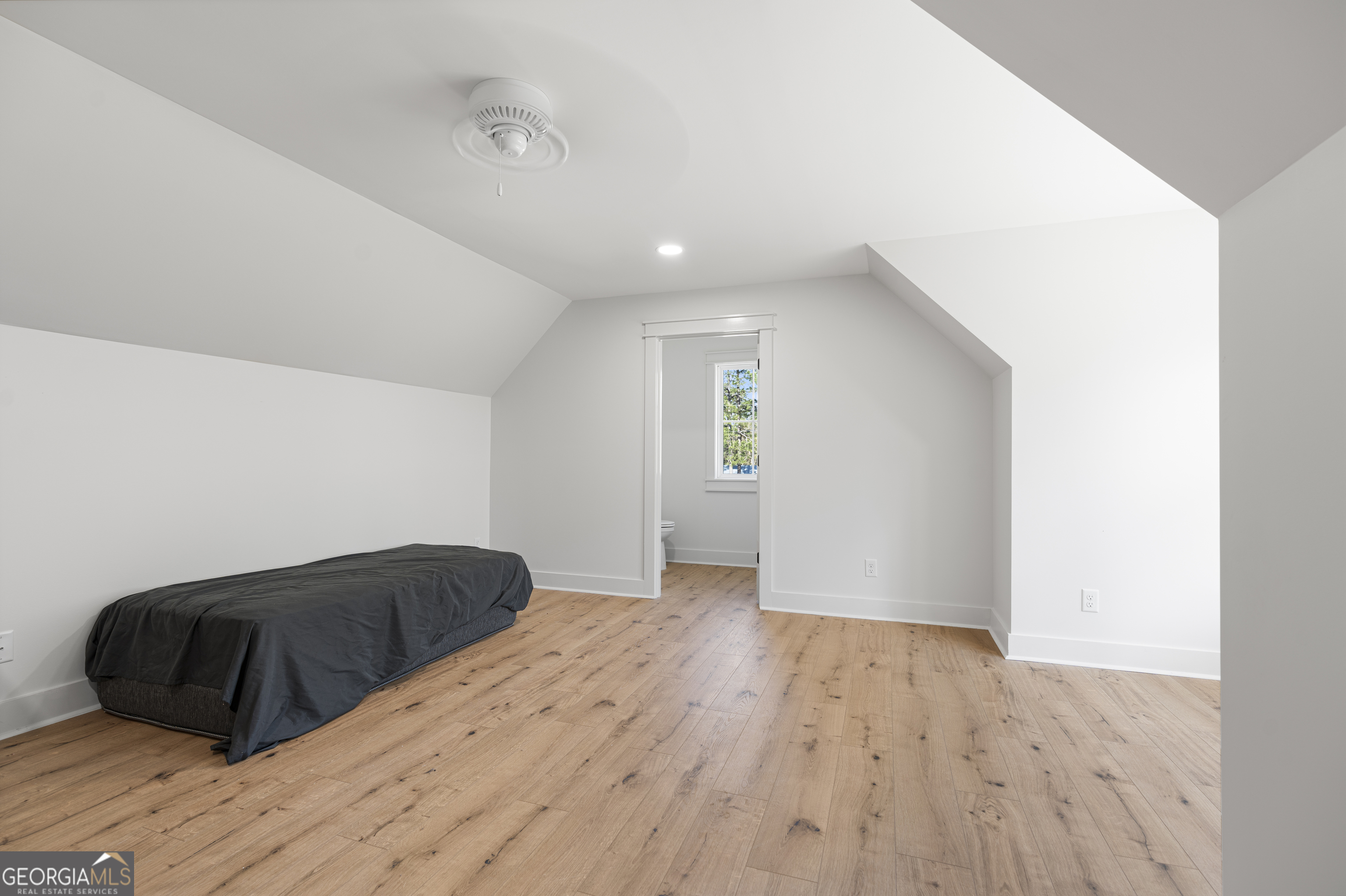 4005 Golfview Drive Blackshear, GA 31516 - Photo 29 of 40 a bedroom with a bed and a window