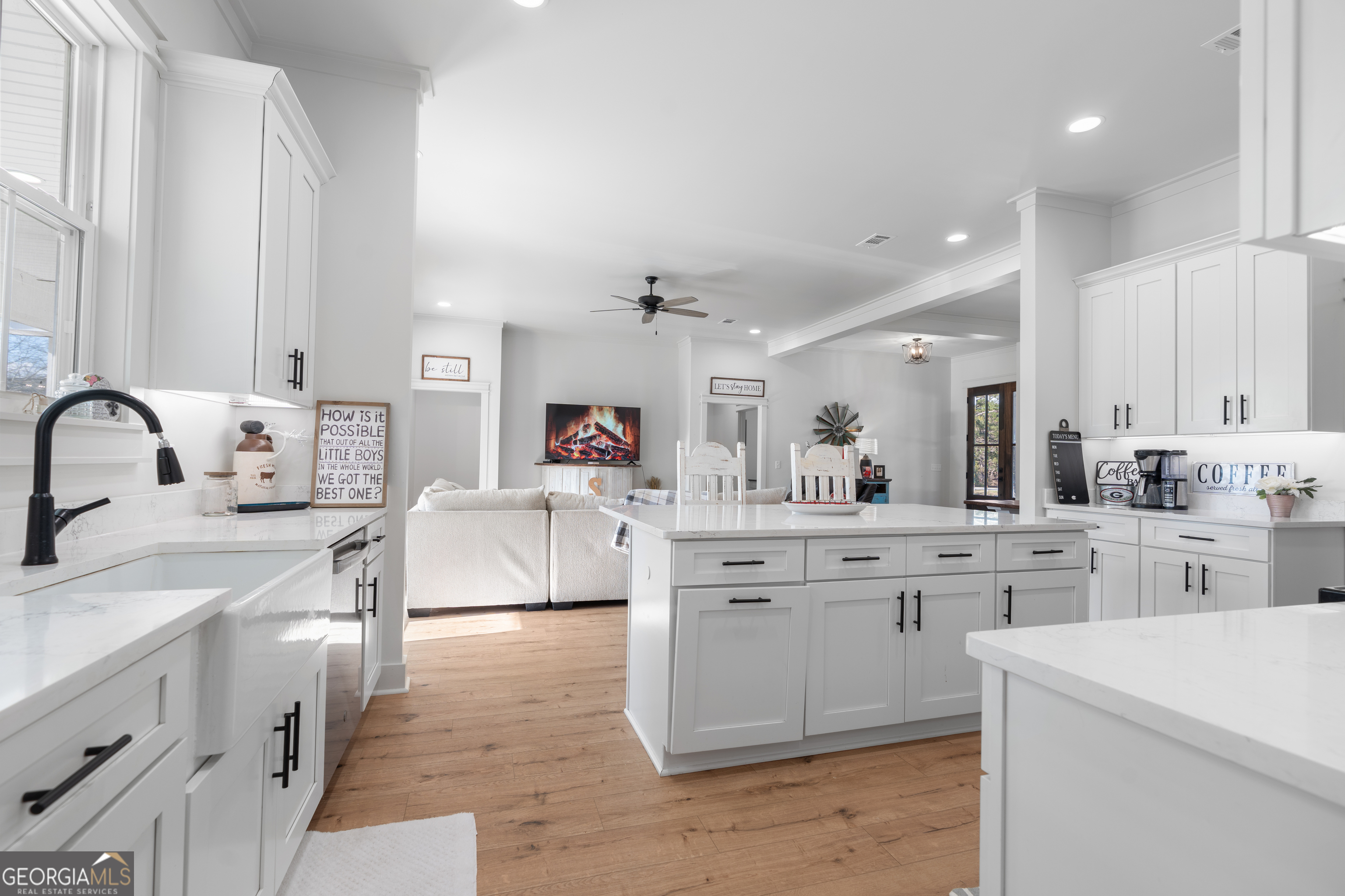 4005 Golfview Drive Blackshear, GA 31516 - Photo 5 of 40 a large white kitchen with cabinets