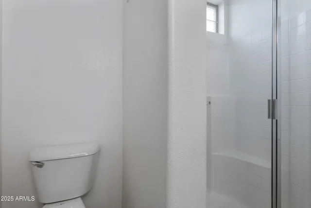 a bathroom with a sink a mirror and a vanity