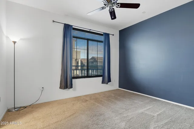 a kitchen with stainless steel appliances granite countertop a stove microwave and cabinets