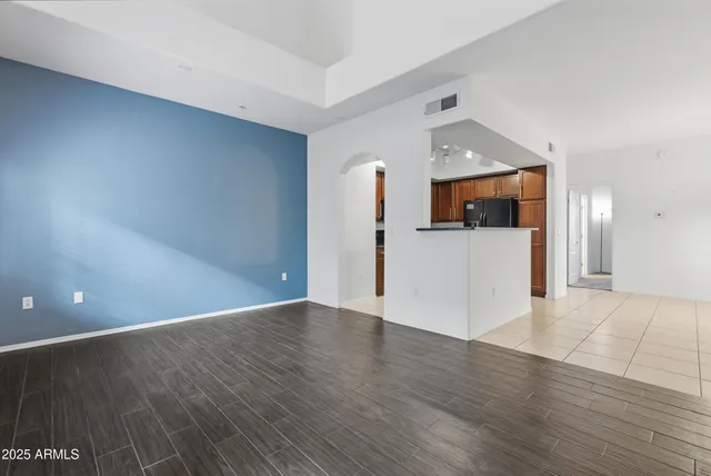 a bathroom with a sink toilet vanity and shower