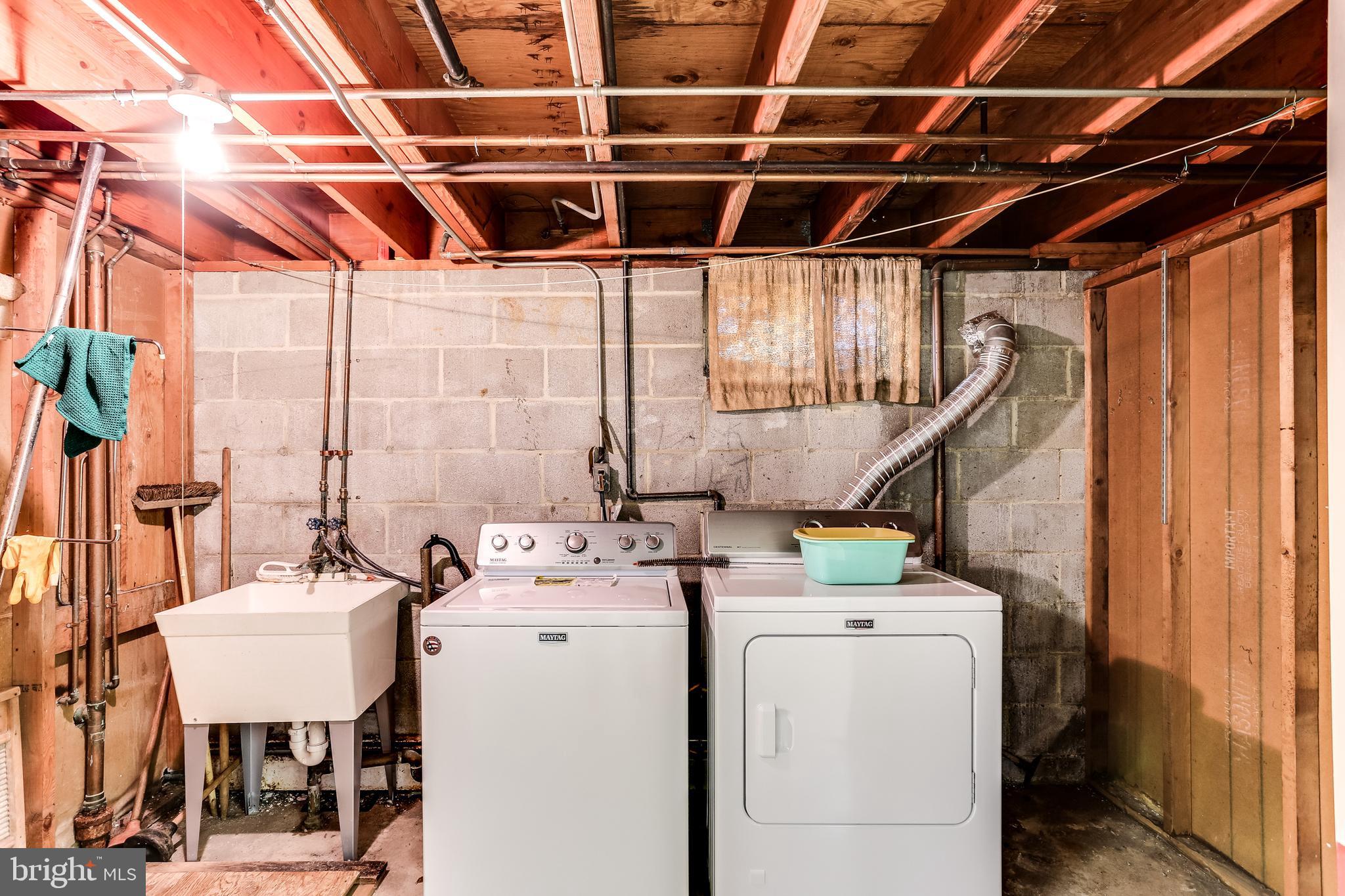 2408 Monticello Road Baltimore, MD 21216 - Photo 23 of 27 a utility room with dryer and washer