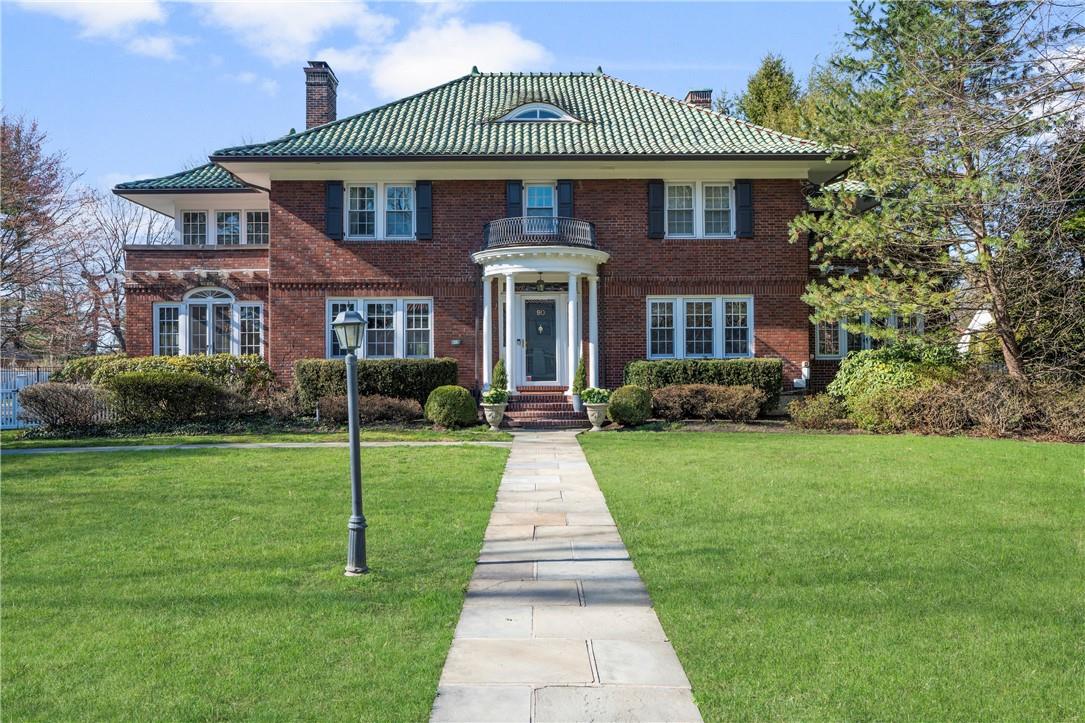 90 Lyncroft Road New Rochelle, NY 10804 - Photo 1 of 1 a front view of a house with a yard