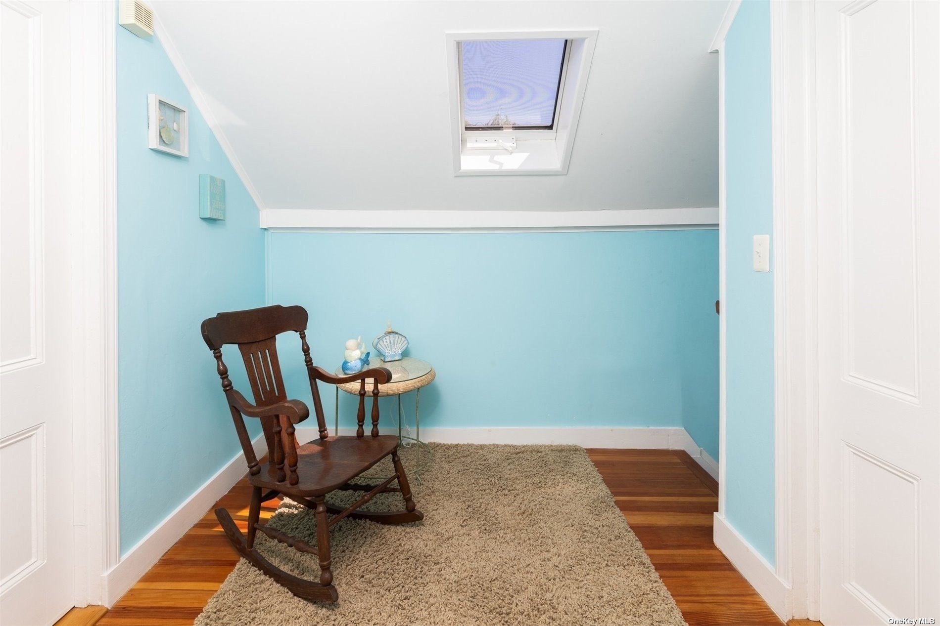 45 Southold, undefined 00000 - Photo 14 of 21 a view of a workspace with furniture and wooden floor