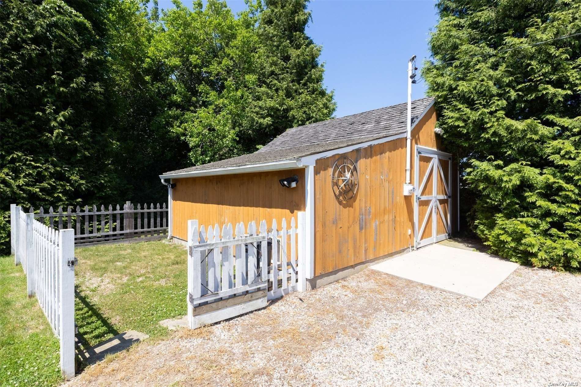 45 Southold, undefined 00000 - Photo 16 of 21 a view of backyard with green space