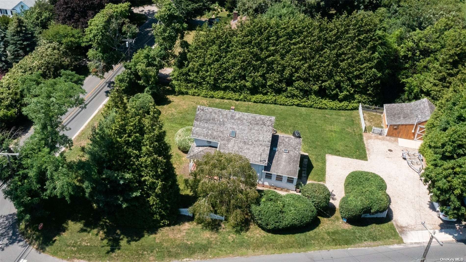 45 Southold, undefined 00000 - Photo 17 of 21 an aerial view of a house with a yard