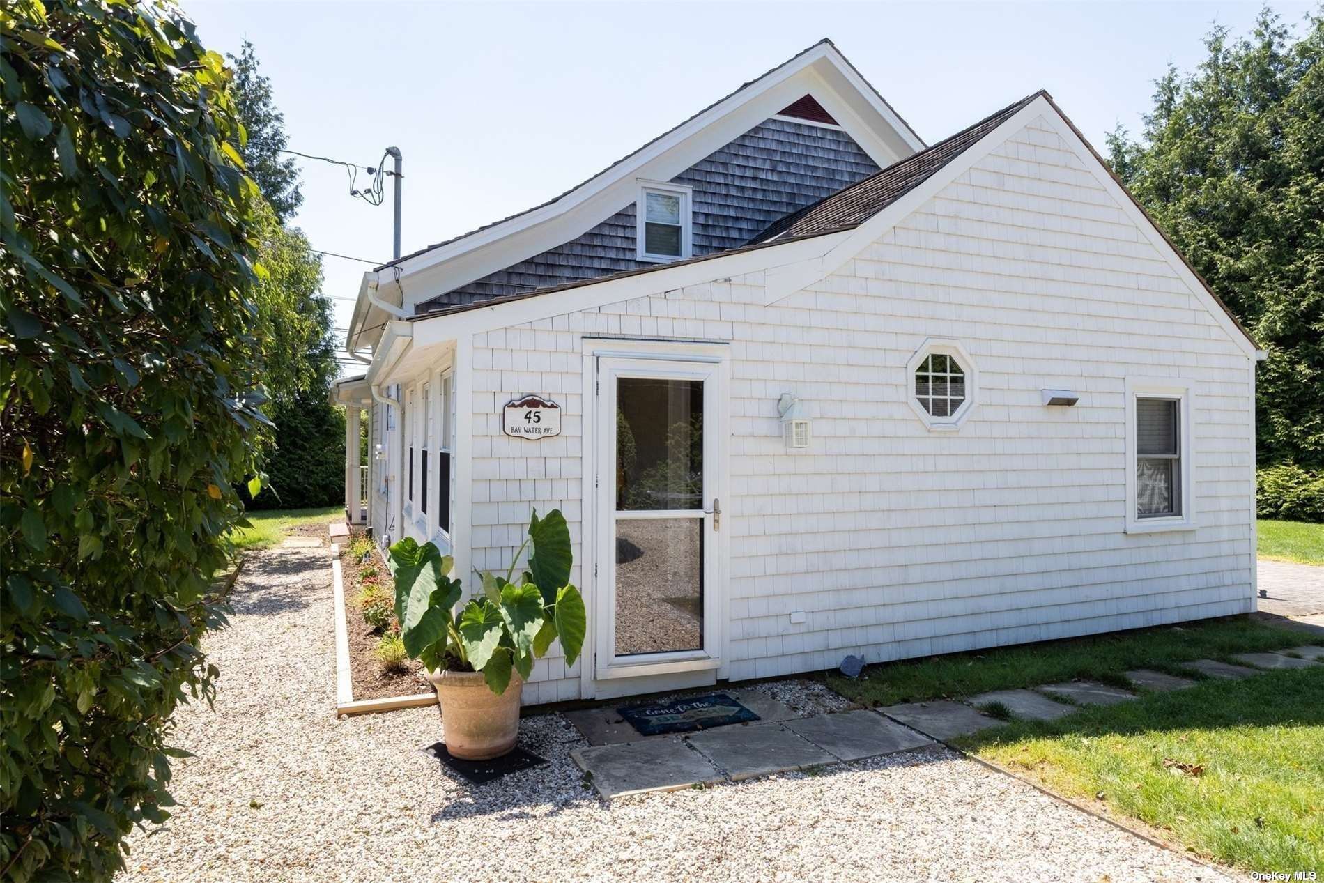 45 Southold, undefined 00000 - Photo 2 of 21 a view of a house with a yard