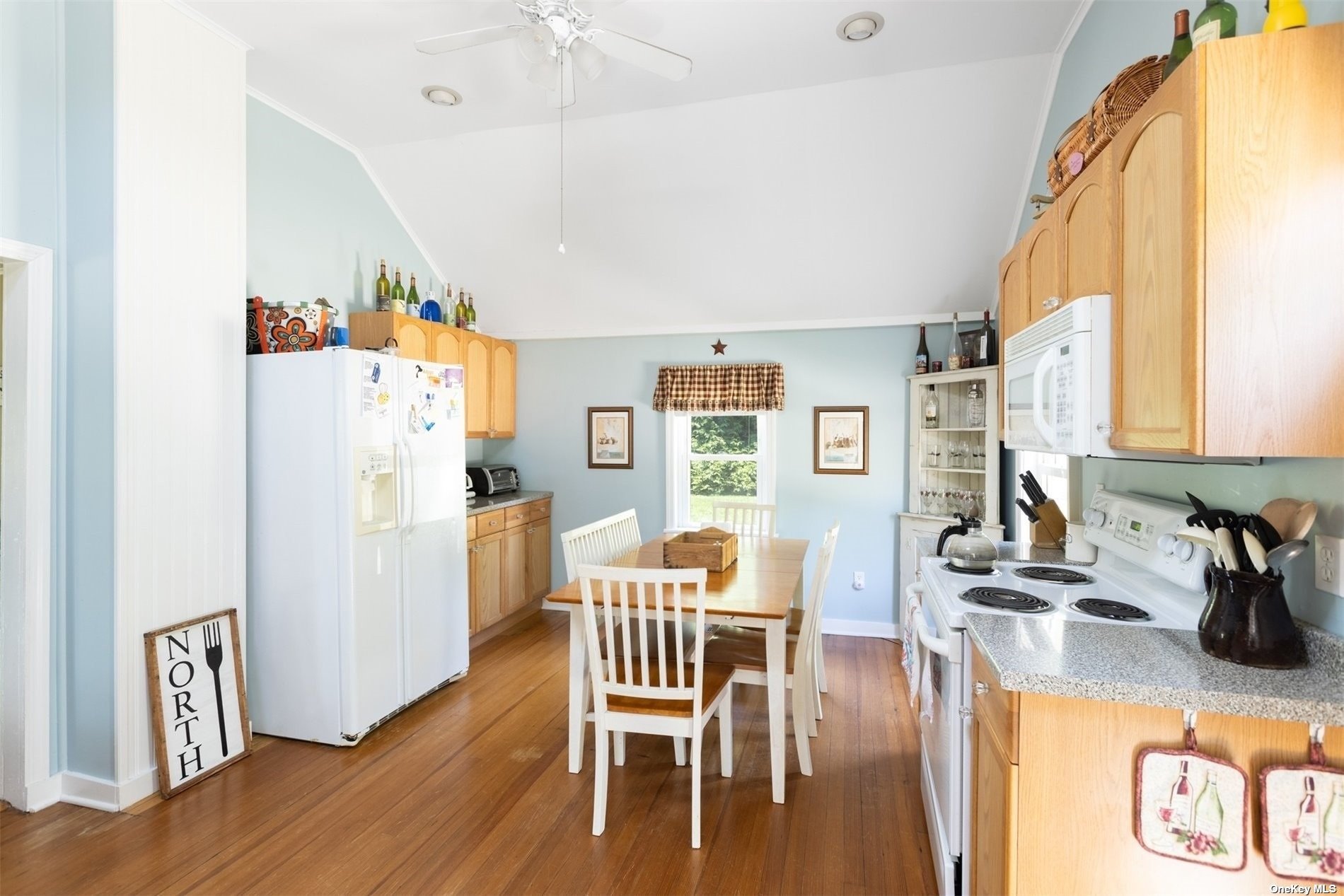45 Southold, undefined 00000 - Photo 8 of 21 a dining room with furniture and wooden floor
