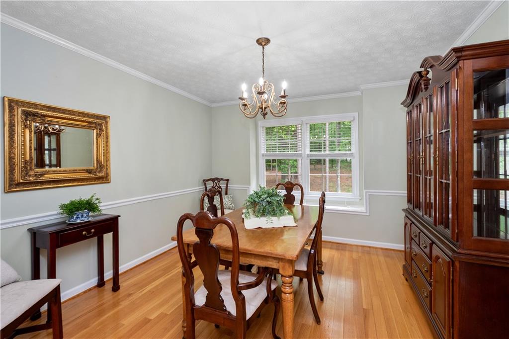 405 Ridgemont Drive Fayetteville, GA 30215 - Photo 5 of 43 a view of a dining room with furniture and a window