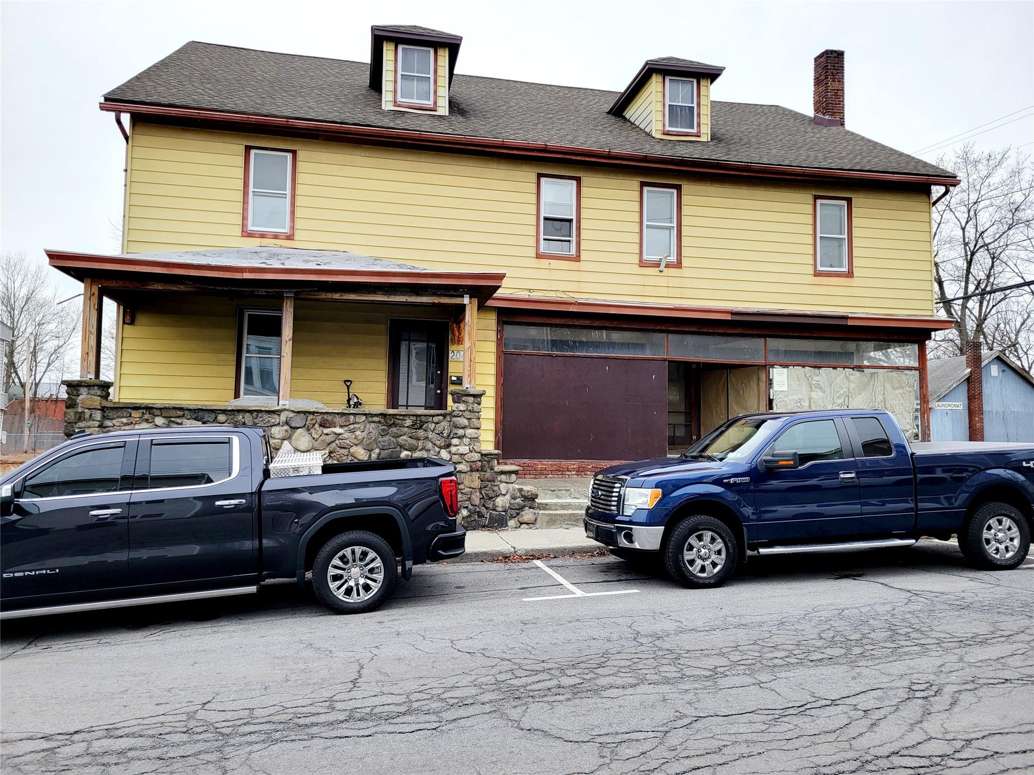 204 Main Street Maybrook, NY 12543 - Photo 1 of 1 a view of a car parked in front of a house
