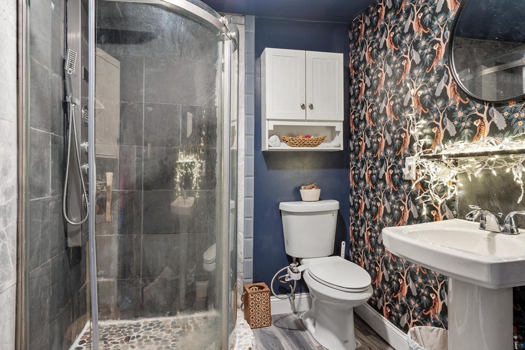 144 Bailey Road Holden, MA 01520 - Photo 20 of 42 a bathroom with a sink toilet and shower