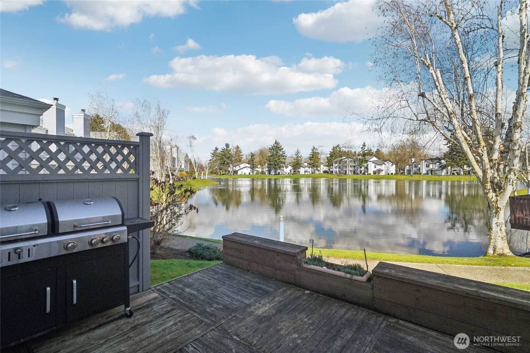 23628 55th Place South, Unit 153 Kent, WA 98032 - Photo 22 of 28 a view of a lake with a outdoor space