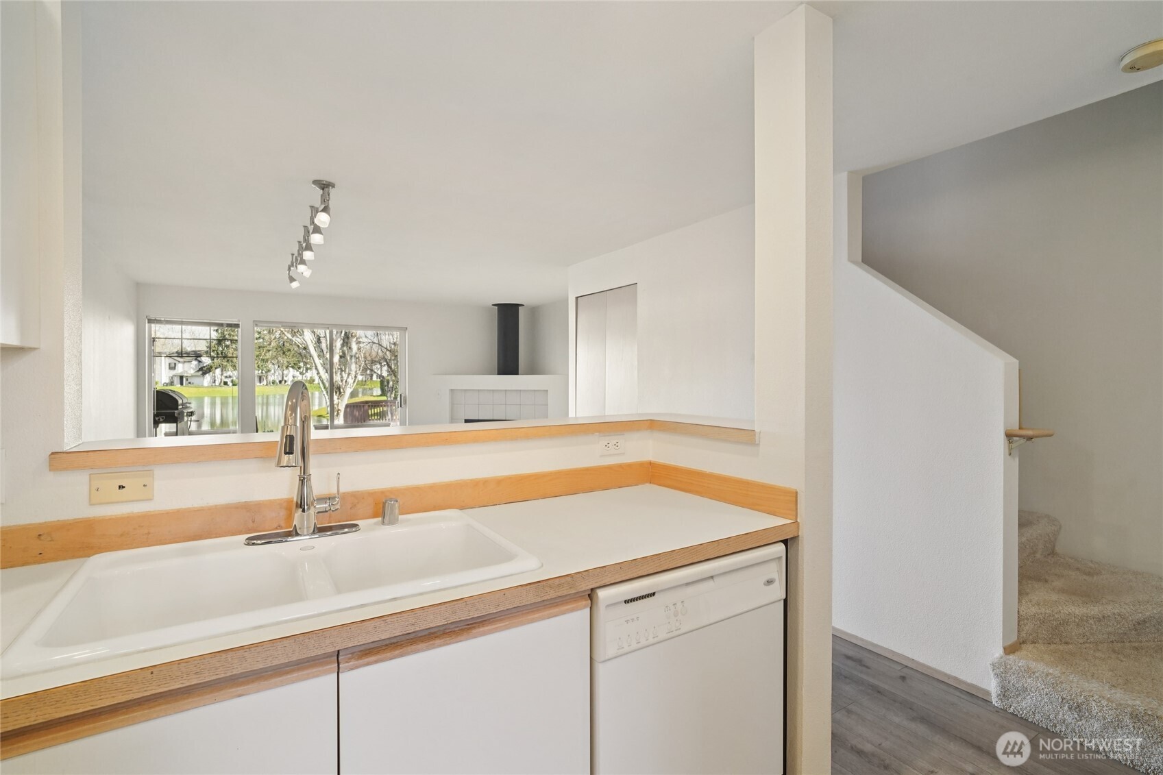 23628 55th Place South, Unit 153 Kent, WA 98032 - Photo 9 of 28 a kitchen with a sink and a window