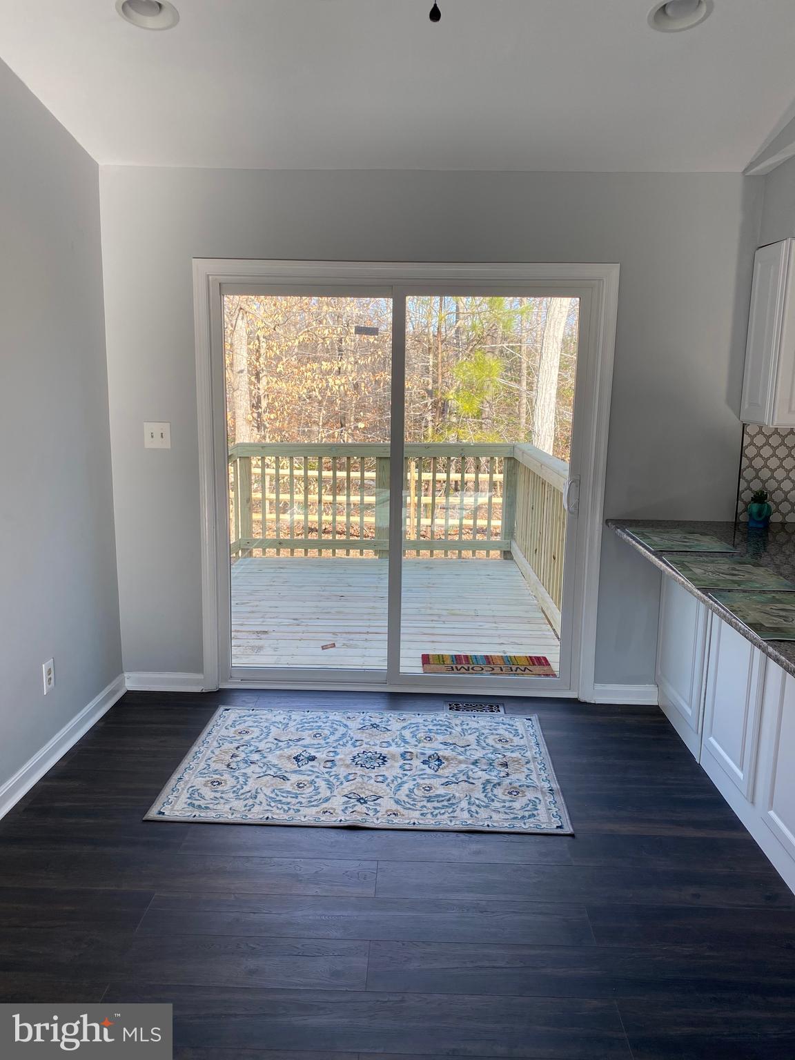 475 Round Up Road Lusby, MD 20657 - Photo 13 of 30 Dining Area w/Slider to deck & backyard