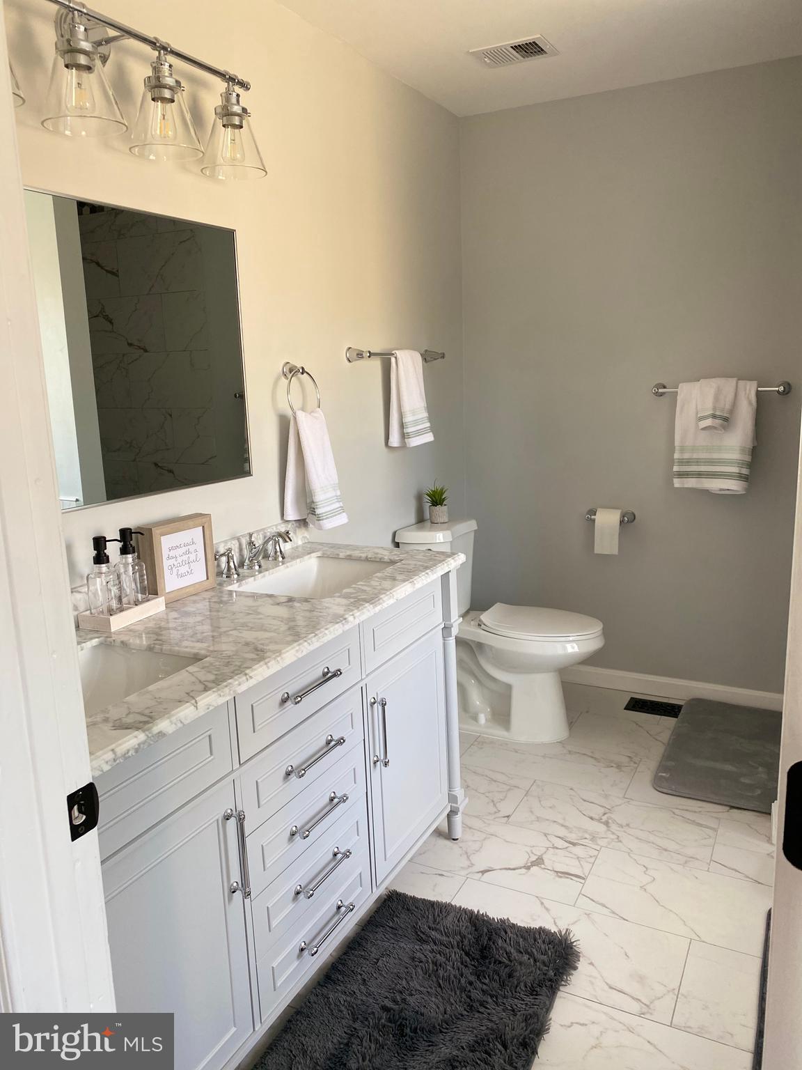 475 Round Up Road Lusby, MD 20657 - Photo 19 of 30 Master BTH vanity w/ marble countertop