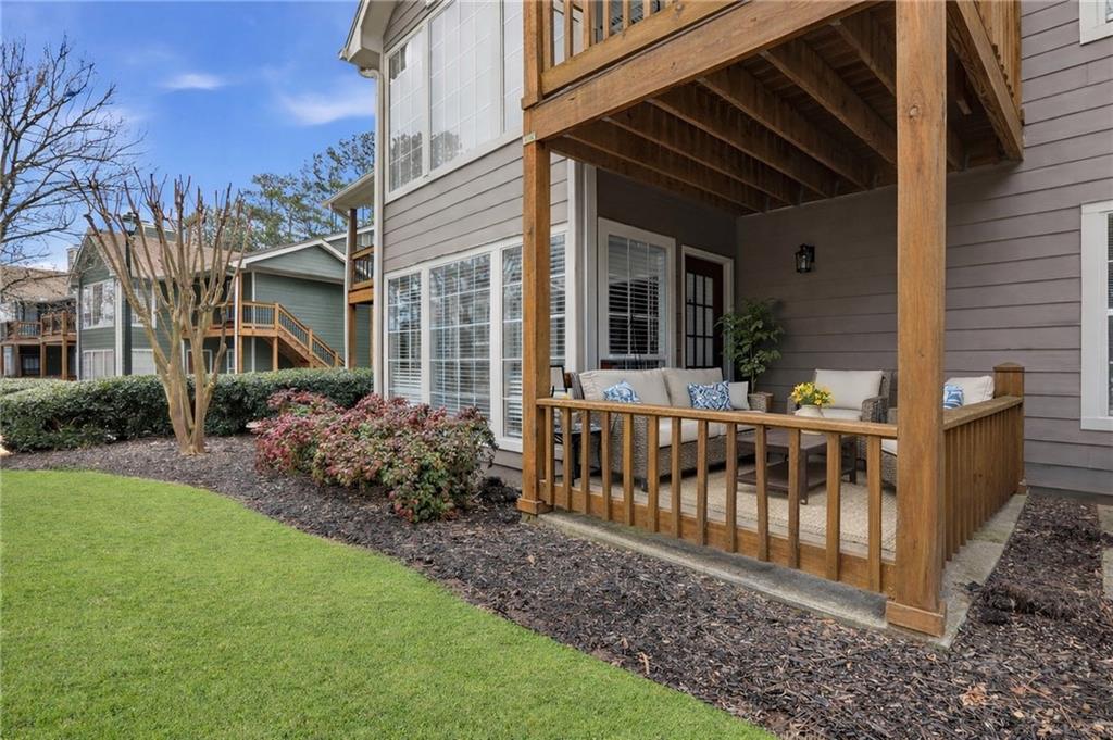 106 Berkeley Woods Drive Duluth, GA 30096 - Photo 14 of 17 a view of a house with backyard and porch