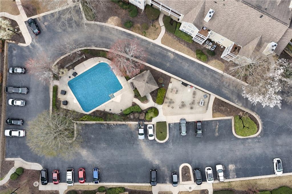106 Berkeley Woods Drive Duluth, GA 30096 - Photo 16 of 17 an aerial view of a house with a swimming pool