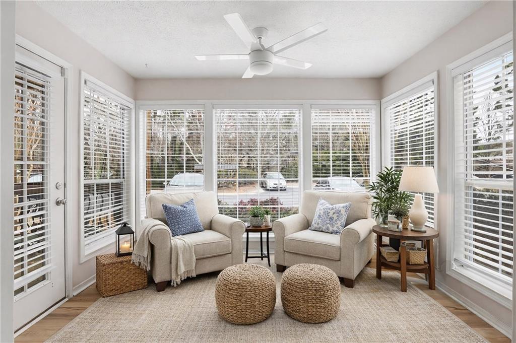 106 Berkeley Woods Drive Duluth, GA 30096 - Photo 3 of 17 a living room with furniture and large windows