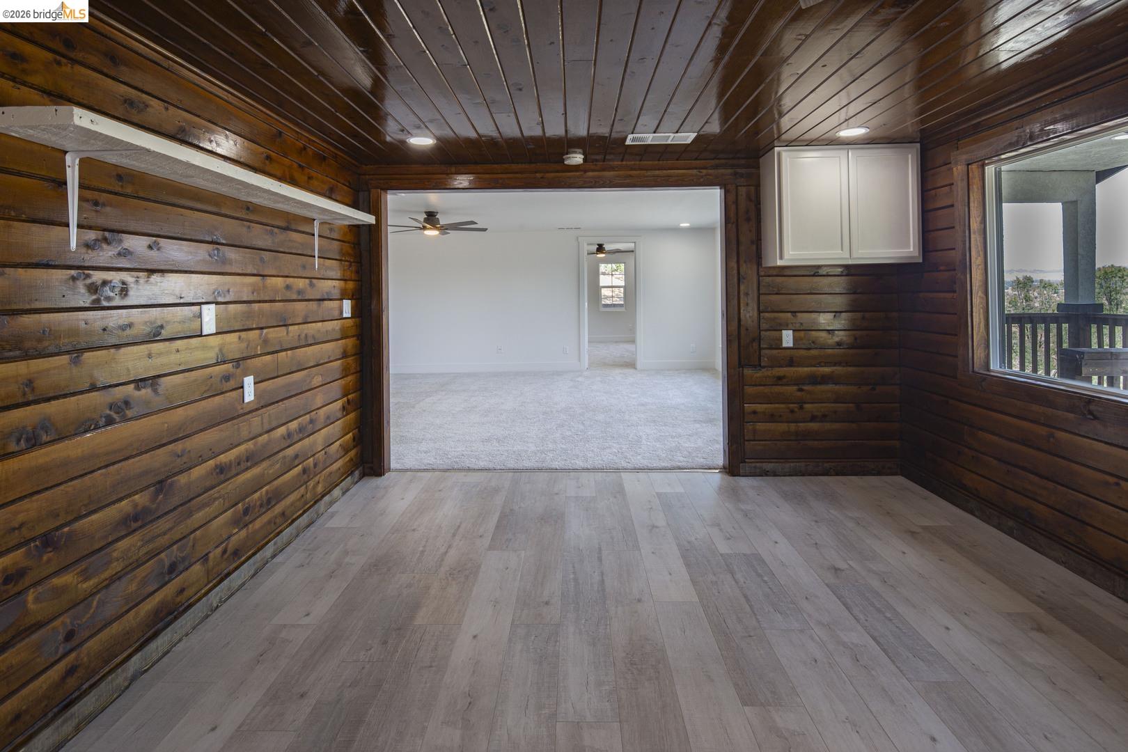 14594 Perricone Road Jamestown, CA 95327 - Photo 17 of 39 a view of an empty room and wooden floor