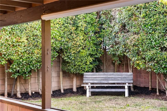a view of a wooden deck with a tree