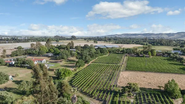 a view of a lake with a yard