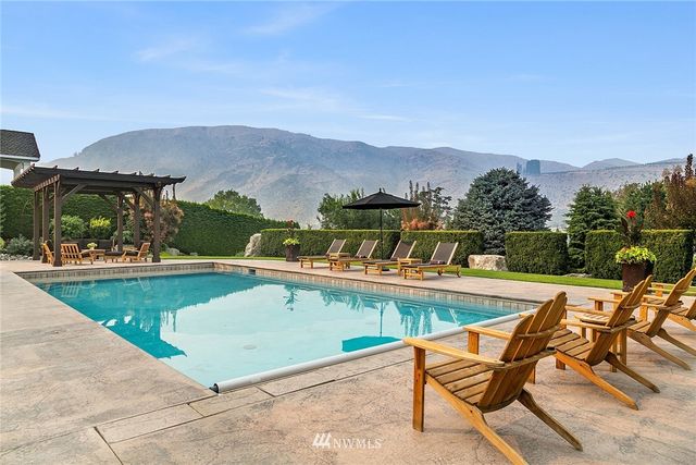 an outdoor view of house with outdoor seating