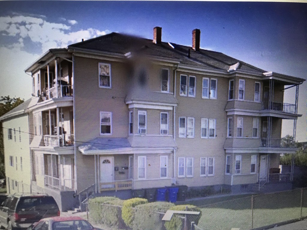 320 Ferry Street Fall River, MA 02721 - Photo 1 of 1 a front view of a building with balcony