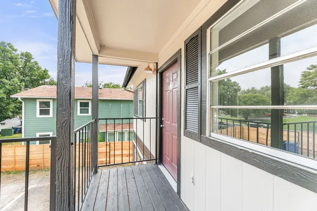 a view of porch with a floor to ceiling window