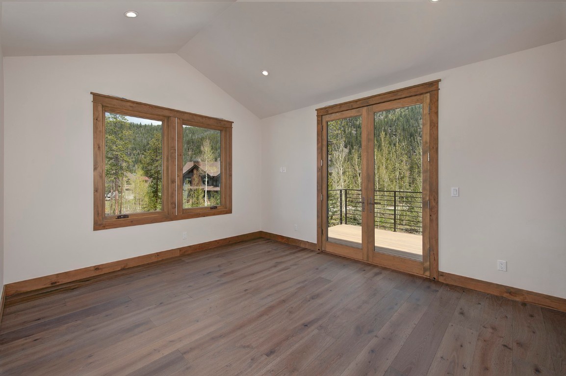 25 Tip Top Trail Keystone, CO 80435 - Photo 25 of 39 a view of an empty room with wooden floor and a window