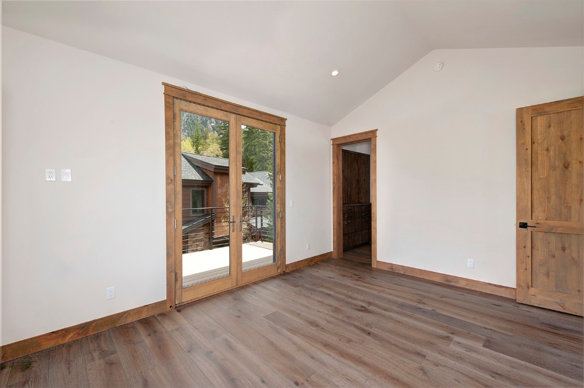 25 Tip Top Trail Keystone, CO 80435 - Photo 26 of 39 an empty room with wooden floor and windows