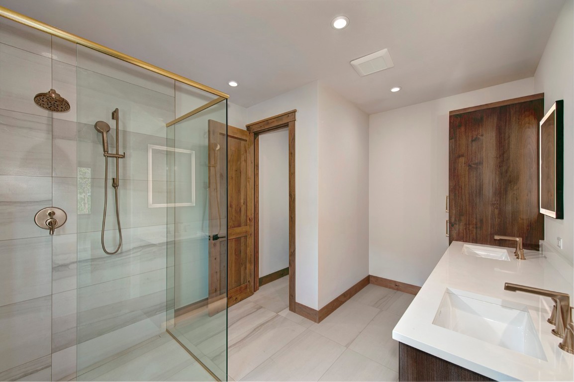 25 Tip Top Trail Keystone, CO 80435 - Photo 27 of 39 a bathroom with a sink and a mirror
