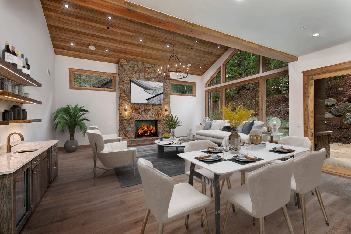 25 Tip Top Trail Keystone, CO 80435 - Photo 4 of 39 a living room with fireplace furniture and a large window
