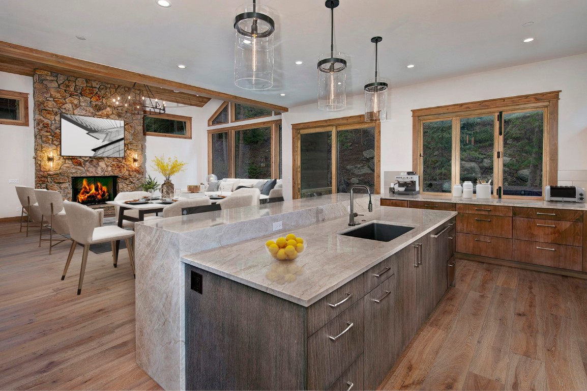 25 Tip Top Trail Keystone, CO 80435 - Photo 6 of 39 a kitchen with a sink stove and wooden cabinets