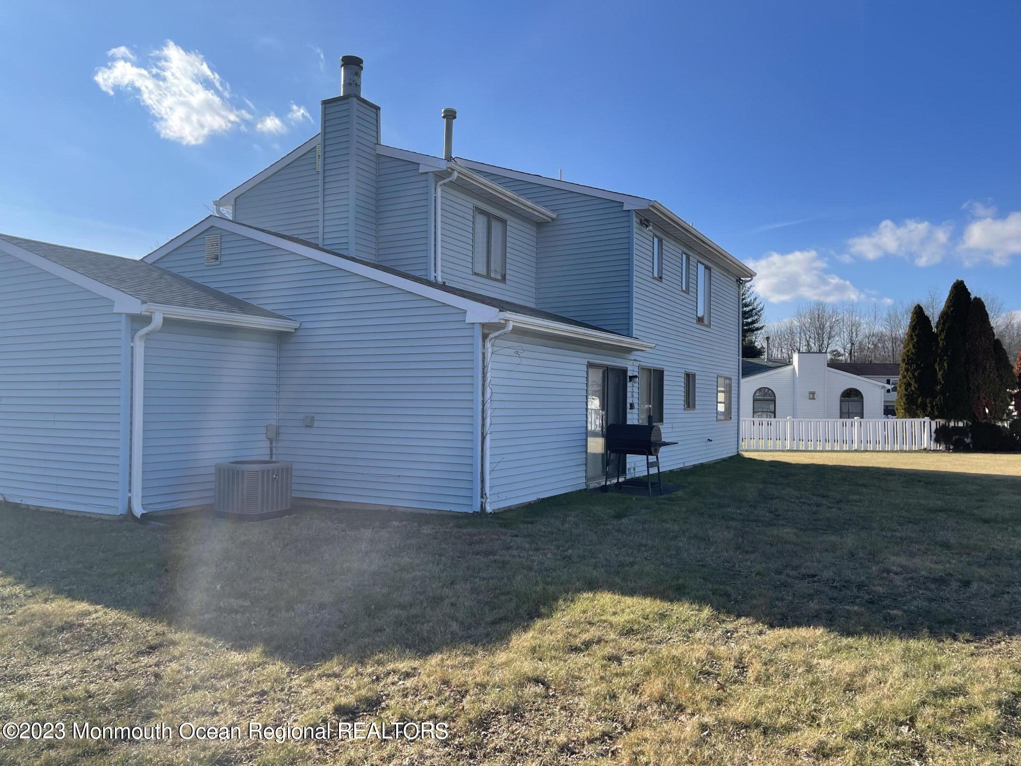 51 Cherry Bend Drive Howell, NJ 07731 - Photo 14 of 18 a view of a house with a yard