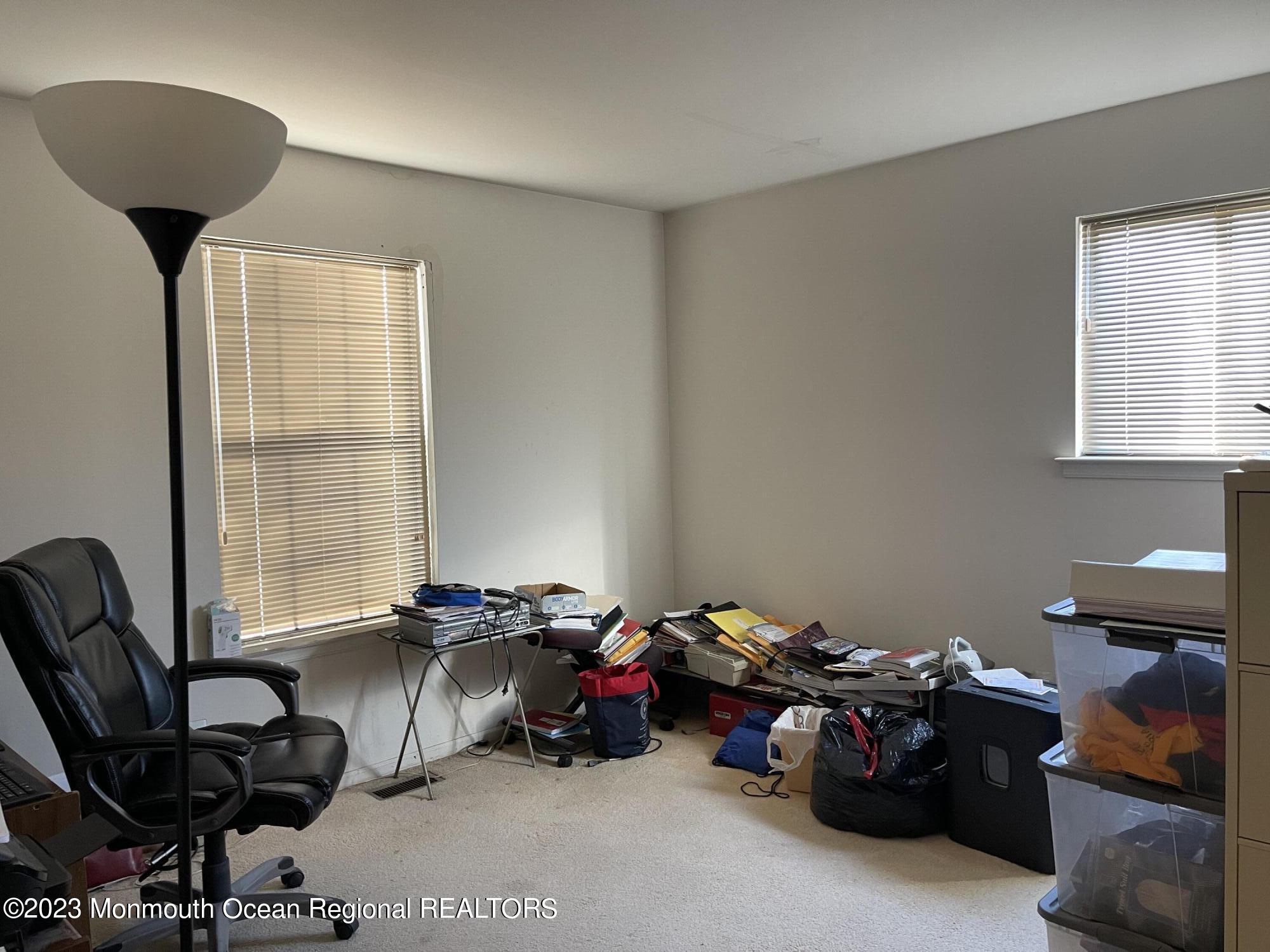 51 Cherry Bend Drive Howell, NJ 07731 - Photo 8 of 18 a view of a livingroom with furniture and a window