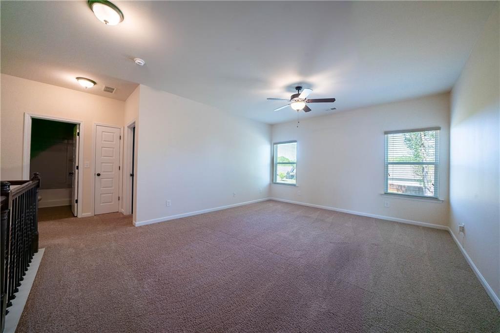 10 Edgewater Court Covington, GA 30016 - Photo 15 of 25 a view of an empty room with a window