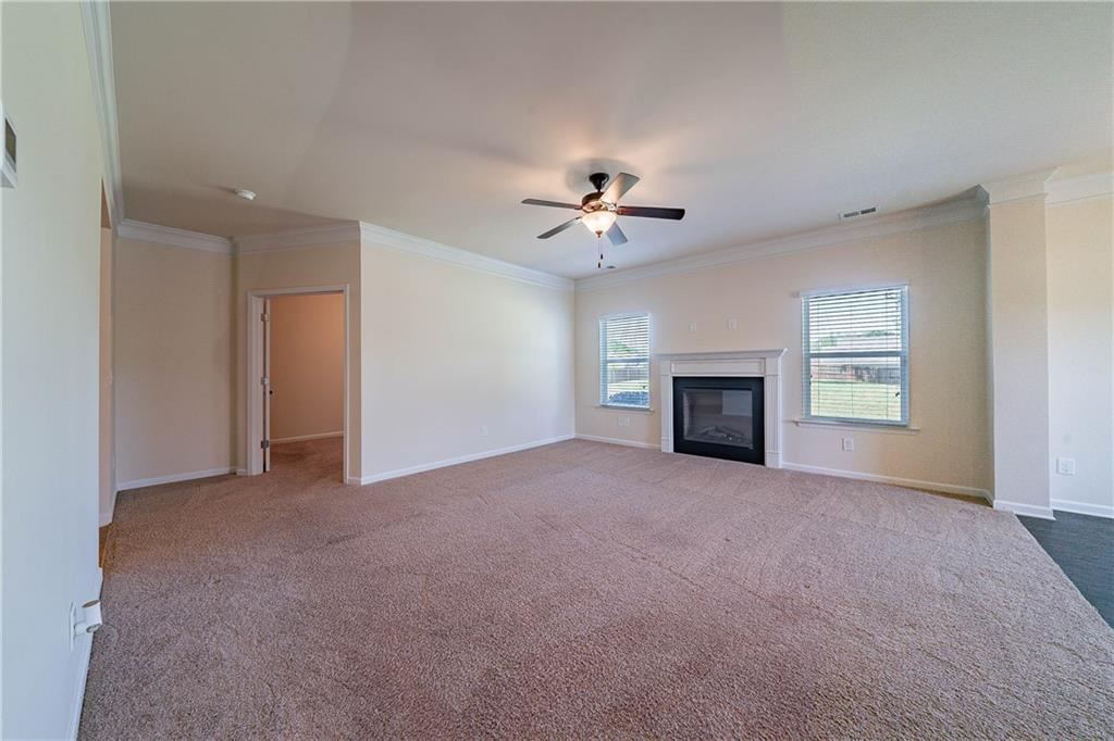 10 Edgewater Court Covington, GA 30016 - Photo 8 of 25 a view of empty room with a fireplace