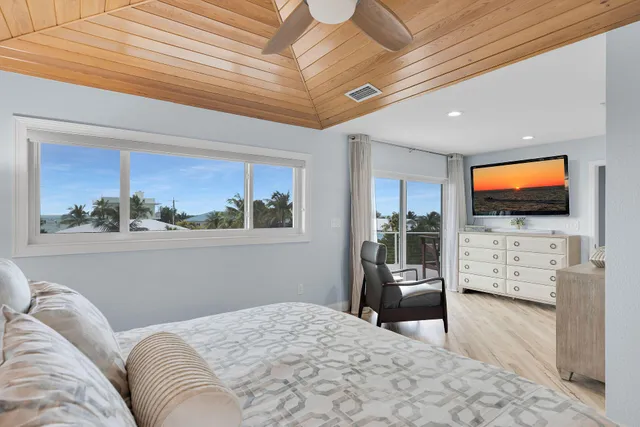 a view of a balcony with chairs