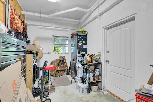 an aerial view of a house with a lake view