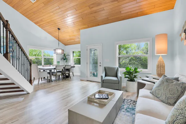 a kitchen with stainless steel appliances a stove sink and refrigerator