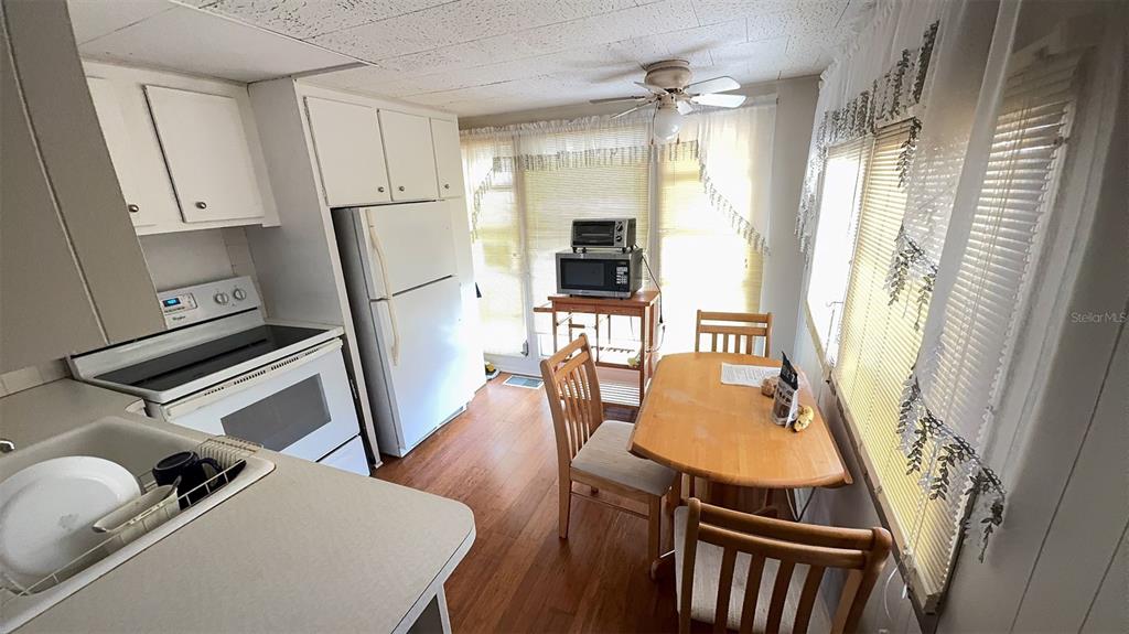 4851 West Gandy Boulevard, Unit B5L5 Tampa, FL 33611 - Photo 14 of 46 a room with furniture and a fireplace